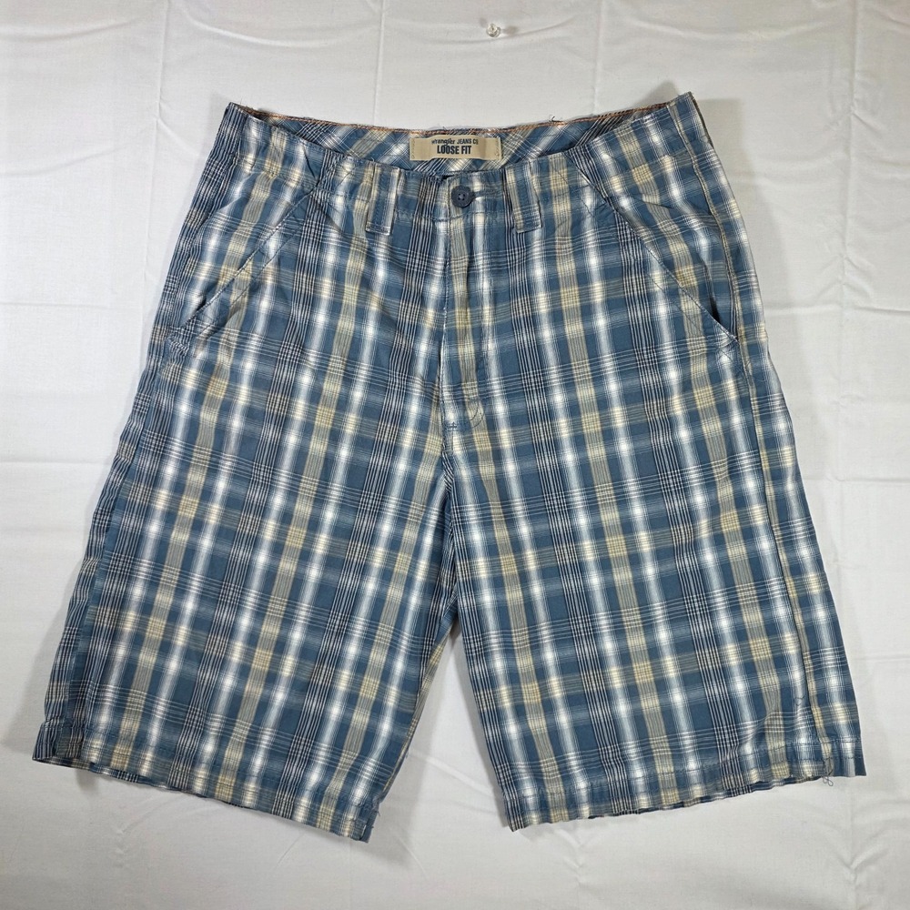 Wrangler Jeans Co. loose fit blue and tan plaid shorts